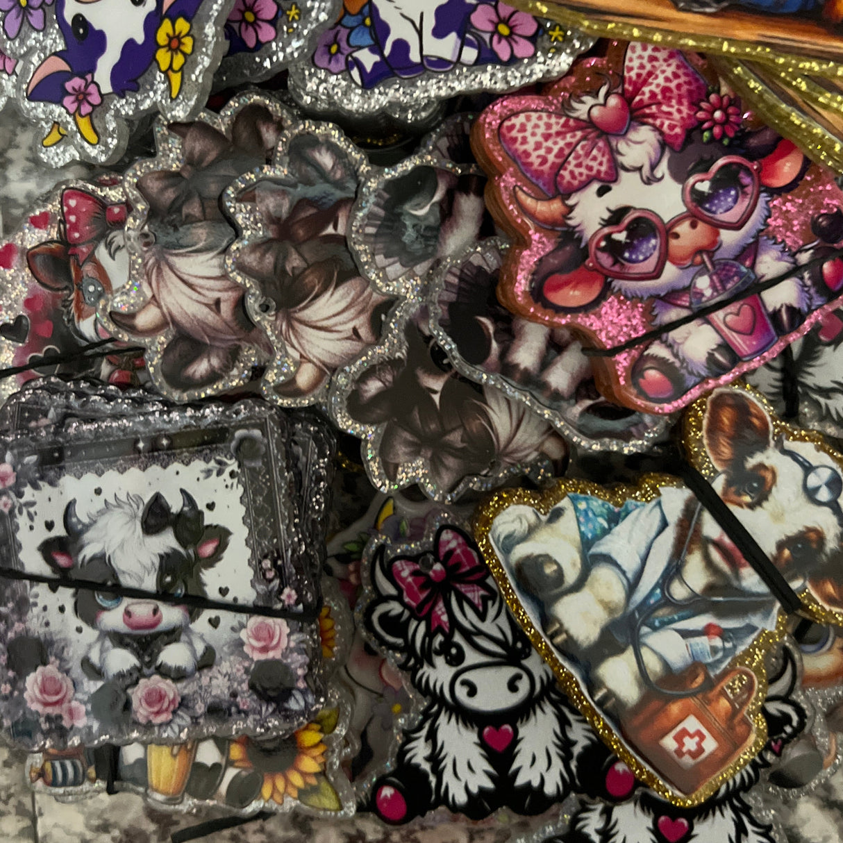 Collection of colorful embroidered patches on a textured surface