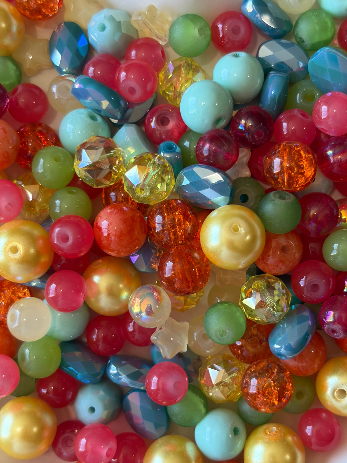Assorted colorful beads in a bowl