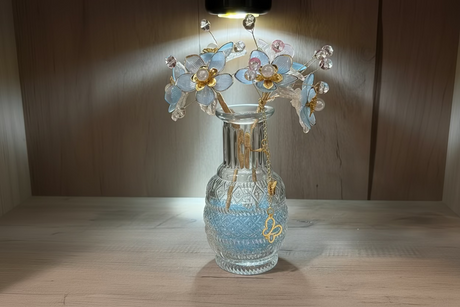 Soft blue floral bead decor styled for home display