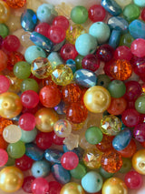 Assorted colorful beads in a bowl