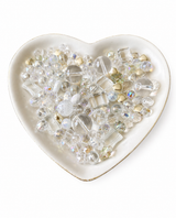 Crystal Dreams Bling Bling Lux Mix clear and iridescent beads in heart-shaped dish on white background