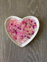 Pink Champagne Bling Bling Lux Mix pink bead assortment in heart-shaped dish