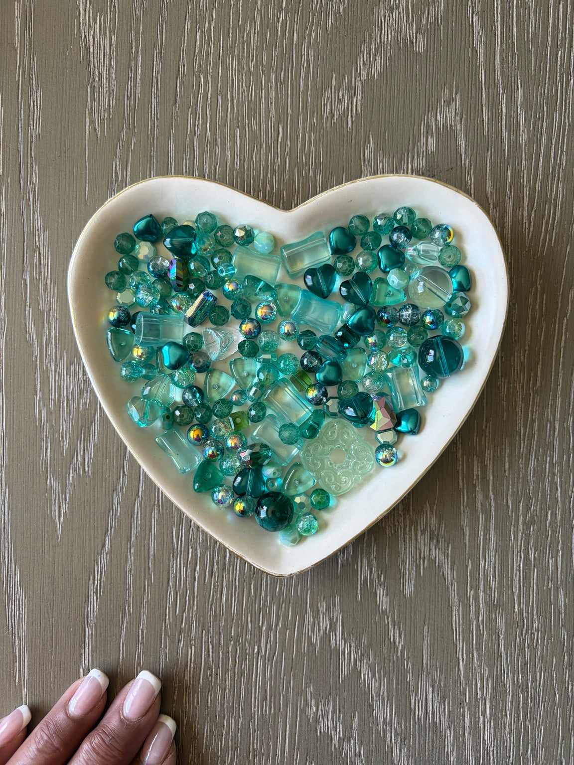 Teal Dreams Bling Bling Lux Mix sparkling teal beads displayed in heart-shaped dish